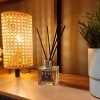 Luxury reed diffuser on living room shelf Luxury reed diffuser on living room shelf